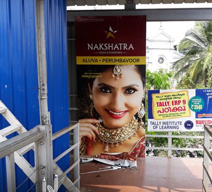 Nakshatra gold and diamonds railway station board branding