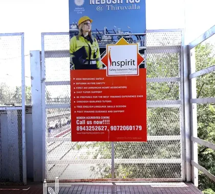 Nebosh IGC_Foot over bridge branding