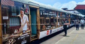 Exterior train branding in India showcasing railway advertising for businesses.