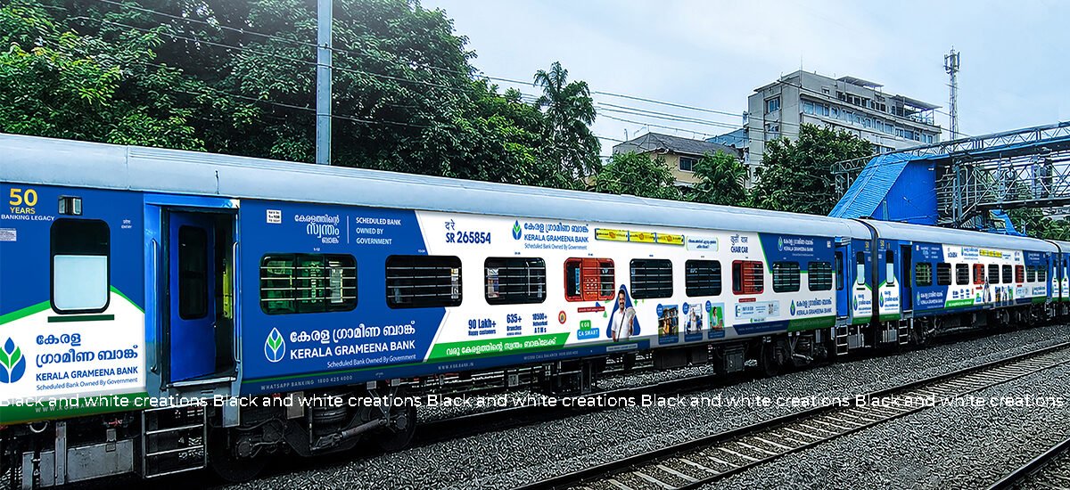 Railway advertising on an Indian passenger train, illustrating train branding and campaign planning costs.
