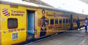 Railway station advertising in India with advertising panels at a passenger railway station.