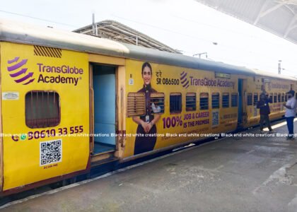 Railway station advertising in India with advertising panels at a passenger railway station.