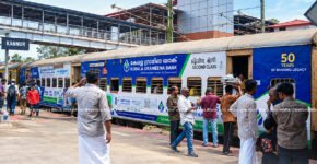 Exterior train branding in India showcasing railway advertising for businesses.