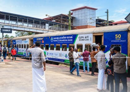 Exterior train branding in India showcasing railway advertising for businesses.
